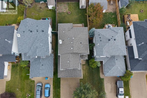 Aerial view of residential houses with attached garages and backyards. - 329 Archibald Close, Fort Mcmurray