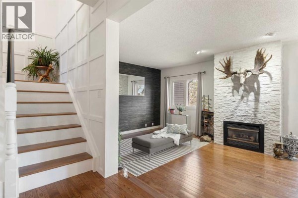 Living room - 33, 448 Strathcona Drive Sw, Calgary, AB T3H1M3 Photo 5