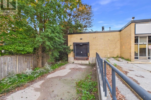 Loading dock entrance at the rear of the commercial building with a ramp. - 33 Argyle Street, Grey Highlands