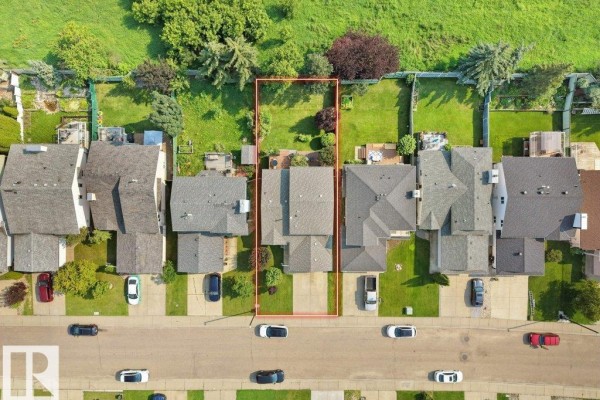 Overhead view of houses on a street, showing driveways, backyards, and property lines. - 330 Pearson Cr Nw, Edmonton