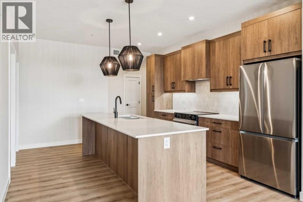 Kitchen - 3301, 3700 Seton Avenue Se, Calgary, AB T3M4J1 Photo 3