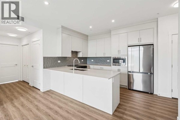 Kitchen - 3303, 3700 Seton Avenue Se, Calgary, AB T3M4K4 Photo 2