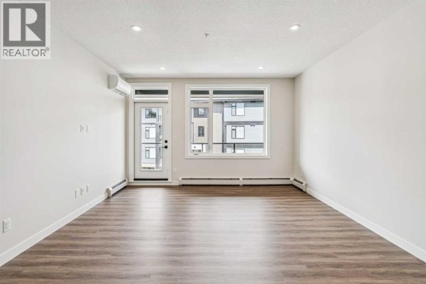 Primary Bedroom - 3309, 3700 Seton Avenue Se, Calgary, AB T3M4J1 Photo 4