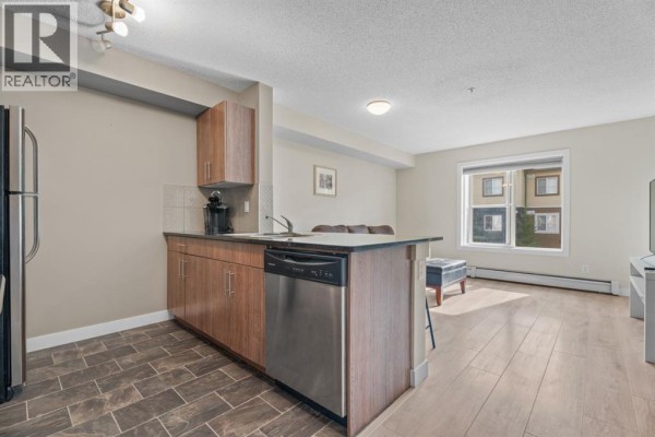 Living room - 3312, 81 Legacy Boulevard Se, Calgary, AB T2X2B9 Photo 5
