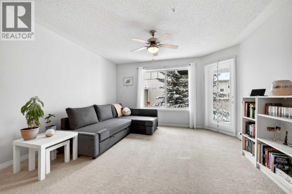 Living room - 332, 369 Rocky Vista Park Nw, Calgary, AB T2R0V5 Photo 4
