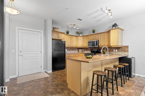 Laundry room - #332 160 Magrath Rd Nw, Edmonton, AB T6R3T7 Photo 5