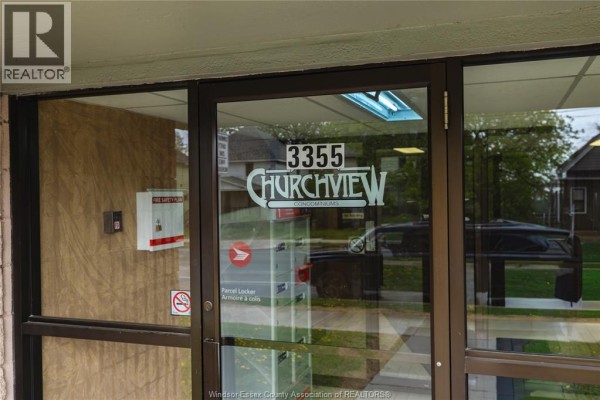 Entrance door to the building with address 3355 Churchview Condominiums. - 3355 Sandwich Unit# 310, Windsor