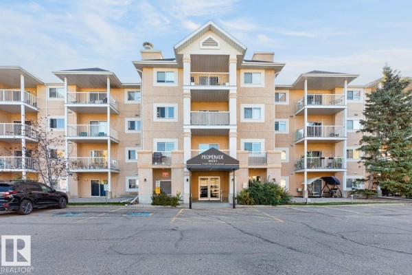 Front facade of the Promenade West apartment building with balconies and entrance. - #339 17447 98a Av Nw, Edmonton