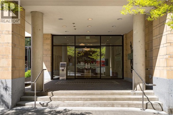 Steps leading up to the glass entrance doors of the building. - 339 770 Fisgard St, Victoria