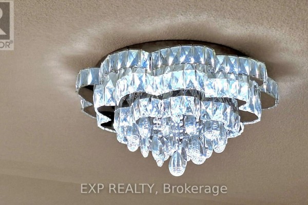 Crystal chandelier with tiered design - 34 Buttonleaf Crescent Whitchurch Stouffville