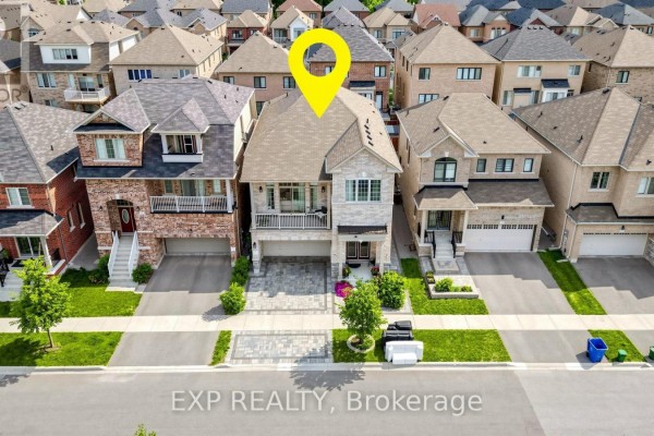 Modern brick house with balcony and paved driveway - 34 Buttonleaf Crescent Whitchurch Stouffville