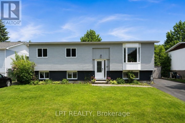 Backyard deck with an above-ground swimming pool, outdoor furniture, and a gas grill. - 34 Fringewood Drive, Ottawa
