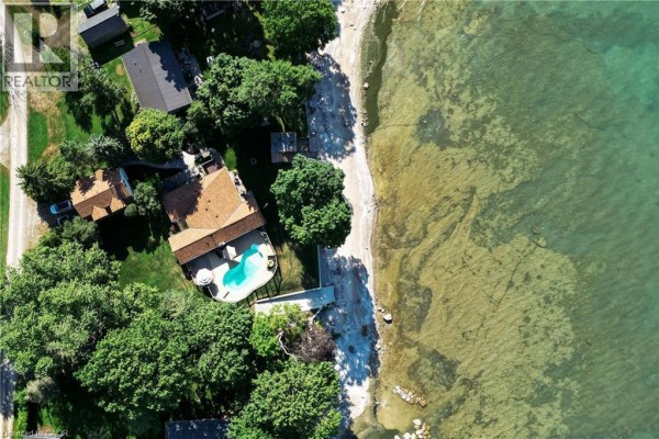 Aerial view of the property showing the house, pool, and waterfront. - 34 Hoover Point Lane, Selkirk