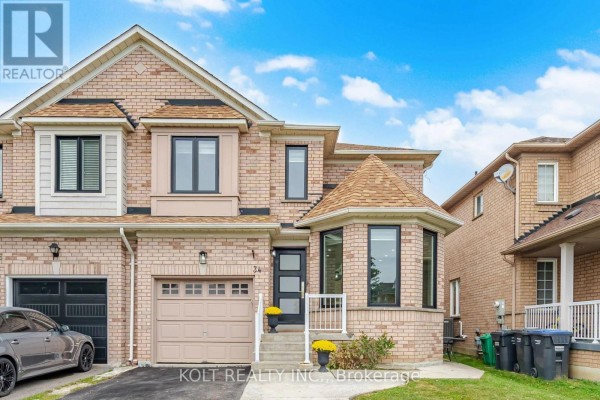 Close-up of the front entrance of a light brick house with a modern glass door. - 34 Saddleback Square, Brampton