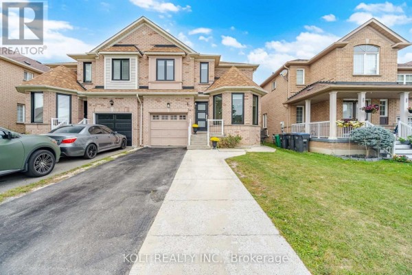 Full front view of a light brick house with a paved driveway and green lawn. - 34 Saddleback Square, Brampton