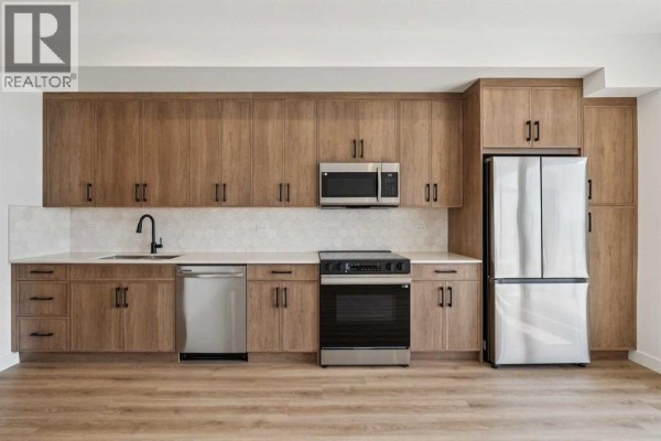 Kitchen - 3402, 3700 Seton Avenue Se, Calgary, AB T3M4J1 Photo 3