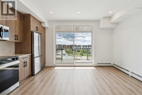 Laundry room - 3402, 3700 Seton Avenue Se, Calgary, AB T3M4J1 Photo 5