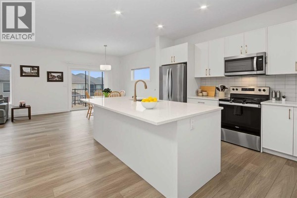 Kitchen - 341 Baneberry Way Sw, Airdrie, AB T4B5S1 Photo 4