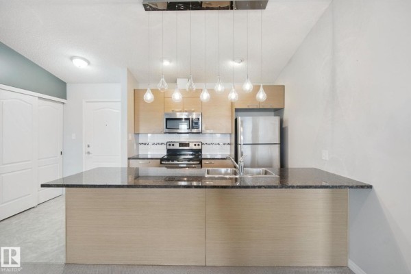 Kitchen - #3415 9351 Simpson Dr Nw, Edmonton, AB T6R0N4 Photo 2