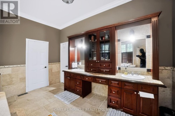 Double vanity with dark wood cabinets and two sinks - 345305 15th Side Road Amaranth
