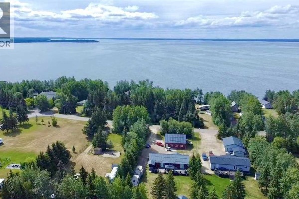Panoramic view of the lake and surrounding residential area from above. - 346, 14579 Twp Rd 690, Lac La Biche