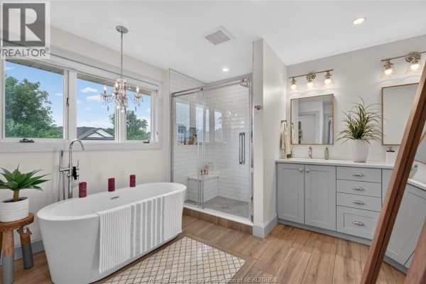 Freestanding tub and glass shower in renovated bathroom - 346 Texas Road Amherstburg