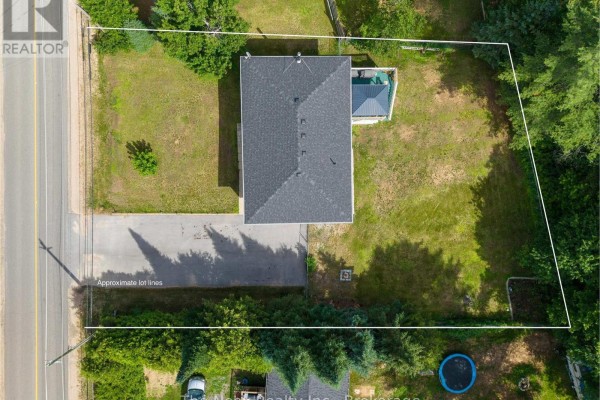 Overhead view showing the back of the house and the property lot lines. - 348 Chemaushgon Road, Bancroft