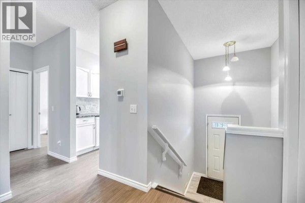 Primary Bedroom - 35, 72 Millside Drive Sw, Calgary, AB T2Y2P9 Photo 5
