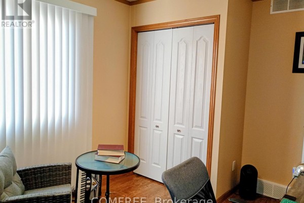 Folding closet doors, side table, and chair - 35 Tanya Drive Southwest Middlesex