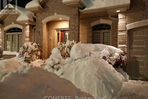 Brick house entrance with snow - 35 Tanya Drive Southwest Middlesex