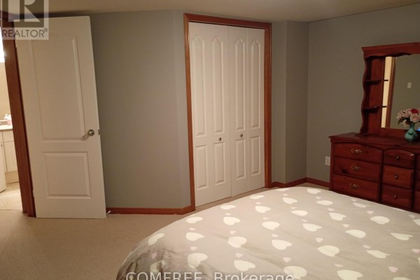 Bedroom with closet, dresser, and heart bedding - 35 Tanya Drive Southwest Middlesex