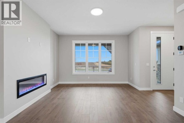 Living room - 355 Belvedere Drive Se, Calgary, AB T2A7Y2 Photo 5