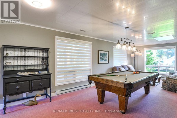 Pool table and seating area in rec room - 3587 Lauderdale Point Crescent Severn