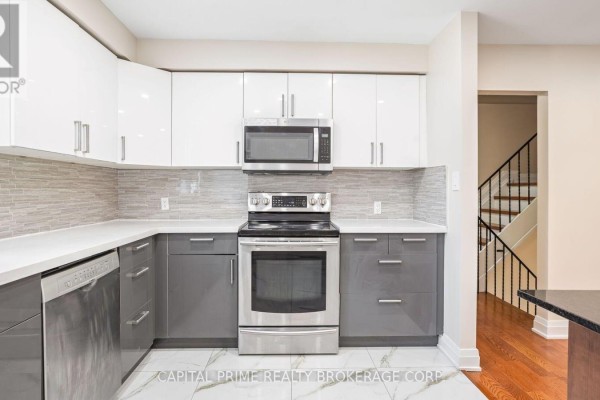 Kitchen - 36 - 250 Bridletowne Circle, Toronto, ON M1W2G8 Photo 2