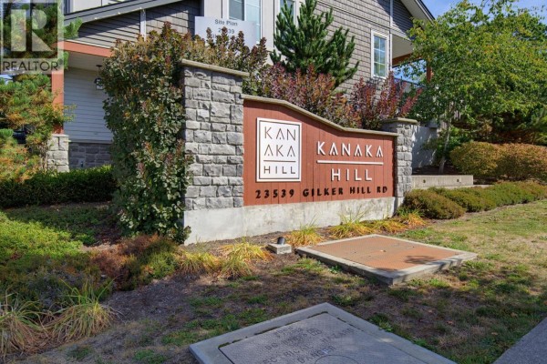 Sign for Kanaka Hill community at 23539 Gilker Hill Road with stone base. - 36 23539 Gilker Hill V2w 1c8 Road, Maple Ridge