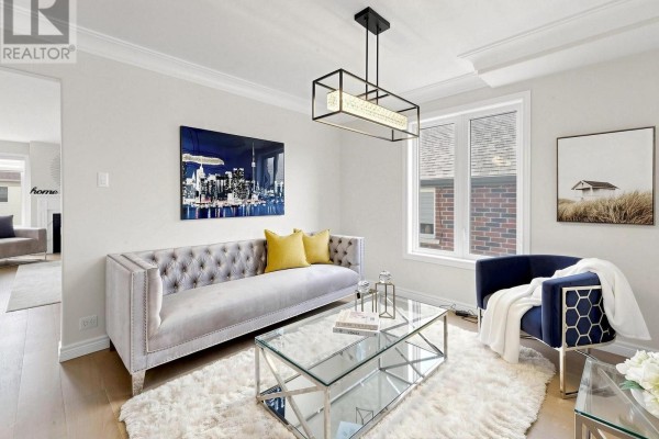View of the living room, entryway, and a partial view of the dining area. - 36 York Drive, Peterborough
