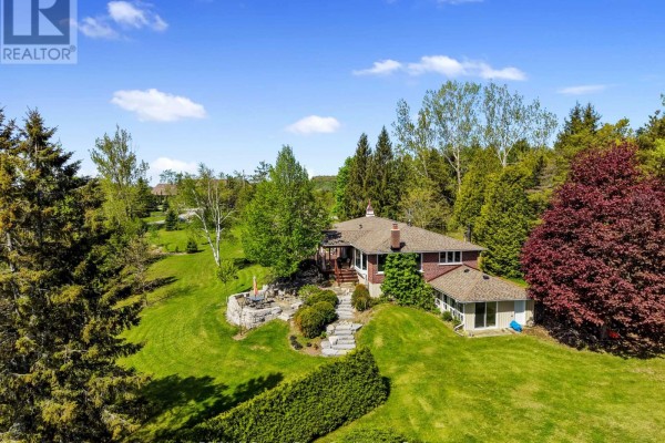 Brick house with stone patio and sunroom - 3625 Alnwick Hill Road Hamilton Township