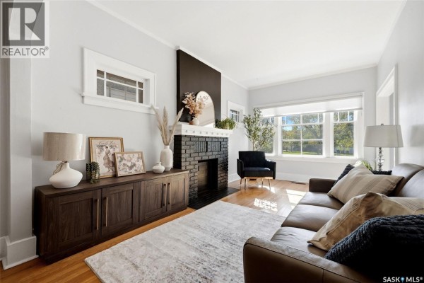Kitchen area featuring white refrigerator, storage cabinet, and tiled floor - 363 Leopold Crescent, Regina