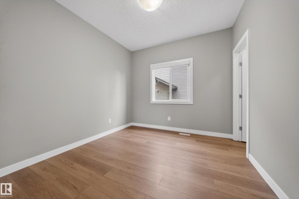 Primary Bedroom - 3639 15a St Nw, Edmonton, AB T6T0M4 Photo 5
