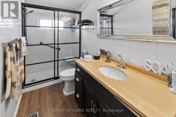 Walk-in shower and modern vanity - 366 Burlington Crescent London South