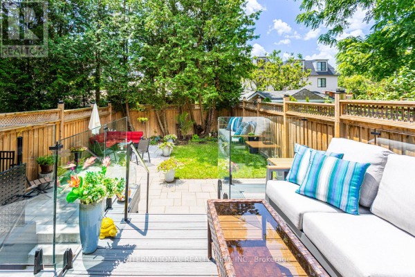 Backyard with deck, patio, lawn, and outdoor seating - 36b Pine Avenue Mississauga