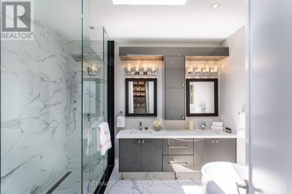Modern bathroom with walk-in shower, double vanity, and freestanding tub - 36b Pine Avenue Mississauga