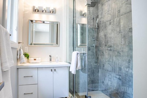 Glass-enclosed shower with modern tile and vanity - 36b Pine Avenue Mississauga