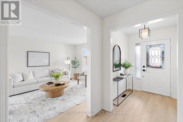 Kitchen with white cabinetry, tiled floor, and a window above the sink - 37 Brandy Crescent, Vaughan