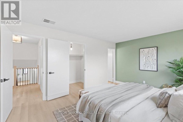 Spacious garage with unfinished walls, storage shelves, and various items scattered - 37 Brandy Crescent, Vaughan