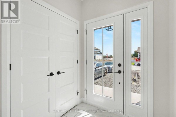 Interior entryway with white doors, a glass-paned front door, and light grey marble flooring. - 37 Helen Street, North Stormont