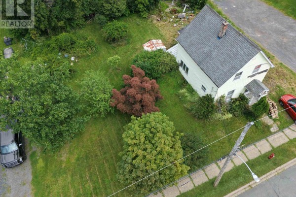 Aerial view of the residential property at 37 Rose Avenue, Trenton, showing the house and yard. - 37 Rose Avenue, Trenton