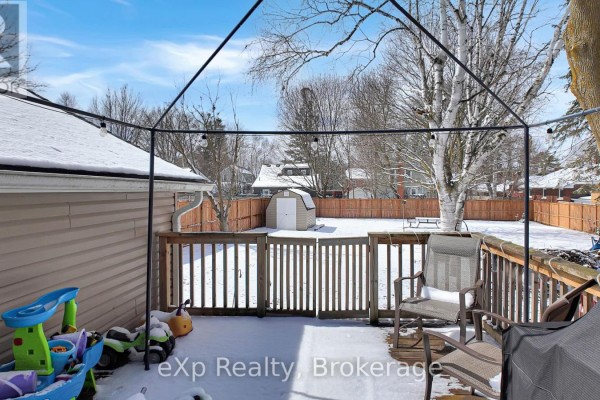 Deck, shed, and fence in a snowy backyard - 370 6th Avenue Hanover
