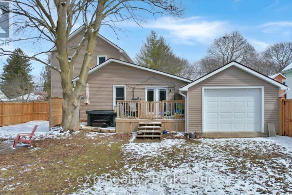 Backyard with deck, hot tub, garage and chairs - 370 6th Avenue Hanover