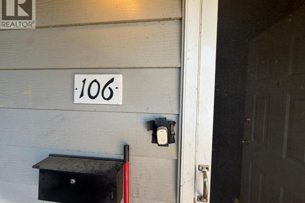 Close-up of unit 106 house number with a mailbox and doorbell. - 3712 24 Avenue Unit# 106, Vernon
